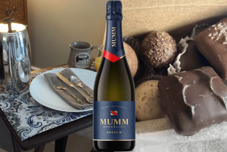 A series of three photos with the one on the left showing a plate with cloth napkin and silverware on a tray, on the right a close up of chocolate bon bons and in the middle a bottle of champagne